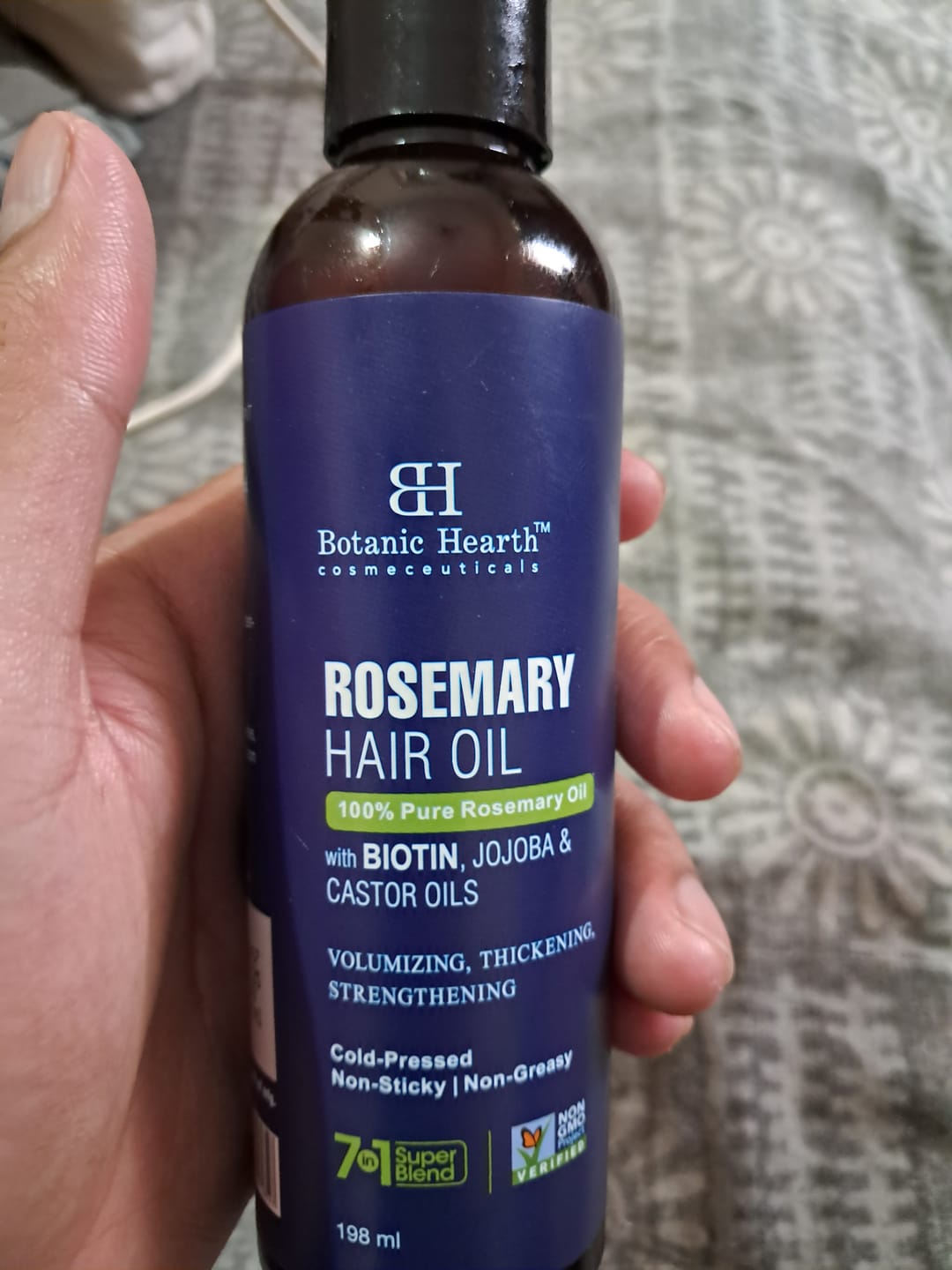 Customer photo review of 100% Pure Rosemary Oil For Hair Growth Infused With Biotin - 198ml