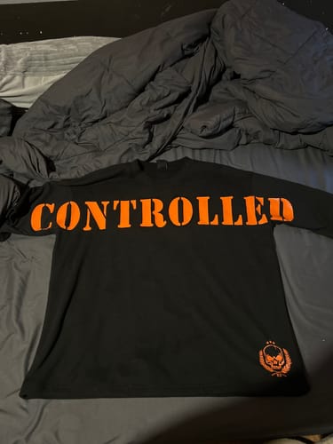 Customer photo review of Orange Forged in Failure Crewneck