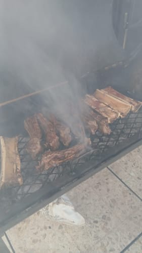 Reseña con foto de un cliente sobre Kit Carne Asada