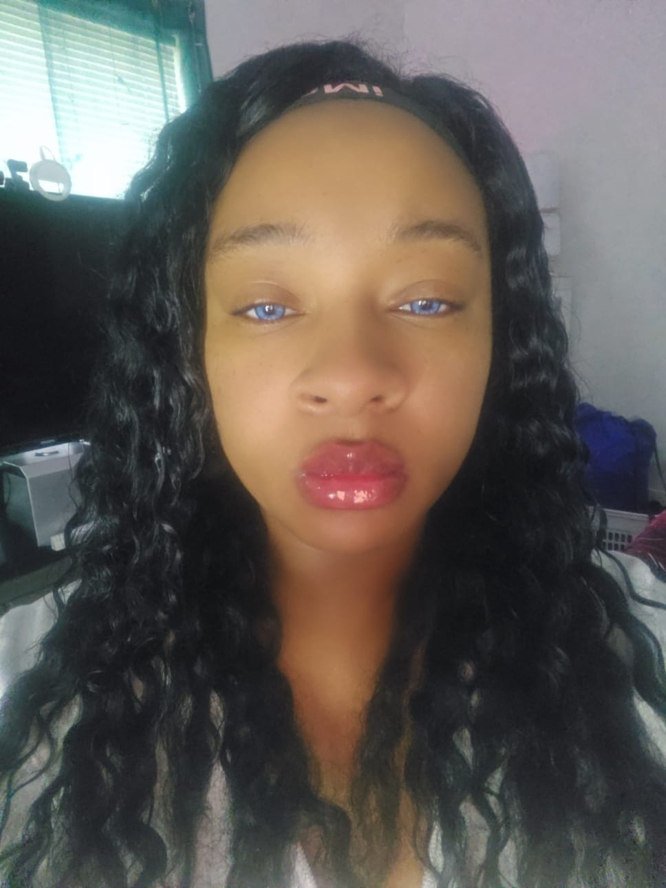 Customer photo review of Amaretto Blue Prescription Colored Contact Lenses