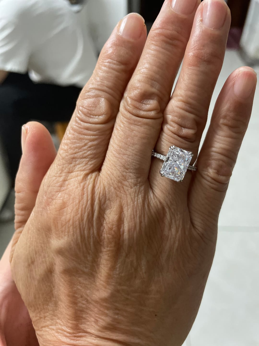 Customer photo review of S925 4.5Ct Radiant Cut Engagement Ring Moissanite/Simulated Diamond Solitaire Stackable Travel Ring For Women