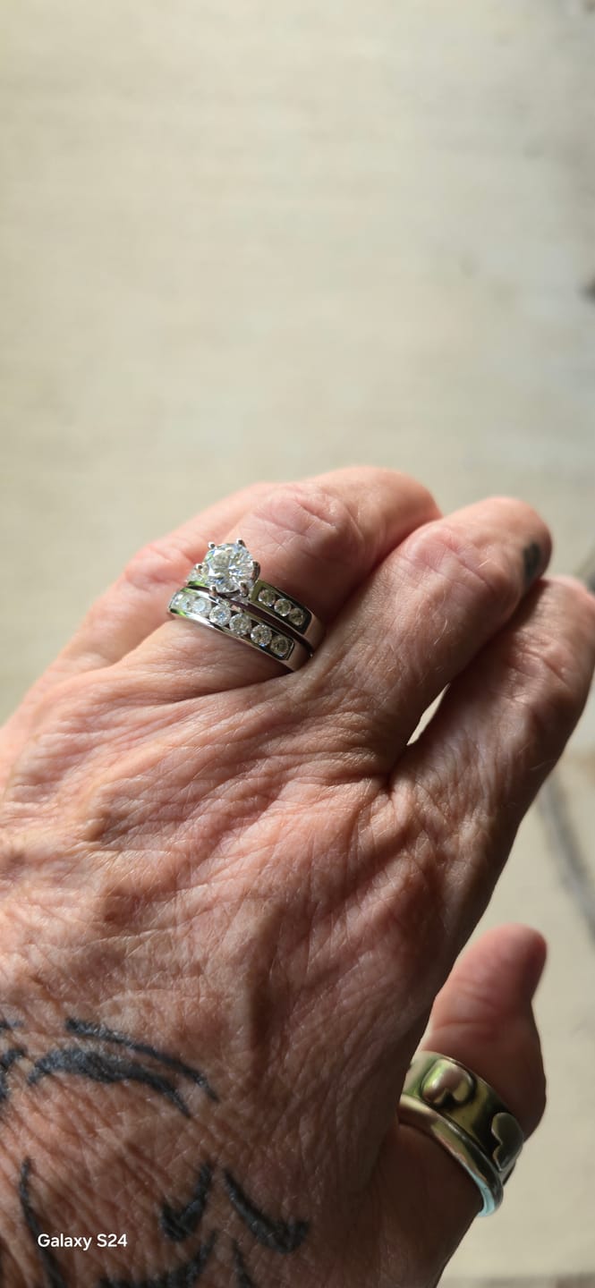 Customer photo review of Channel Set Moissanite Half Eternity Wedding Band Ring In Sterling Silver