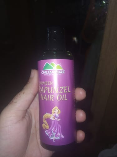 Customer photo review of Rapunzel Hair Oil - Combinations of Different Herbal Oils, Prevents From Dandruff Hair Fall, Improves Hair Growth & Promotes Shiny, Strong Hair,,♀️👩 Women's First Choice