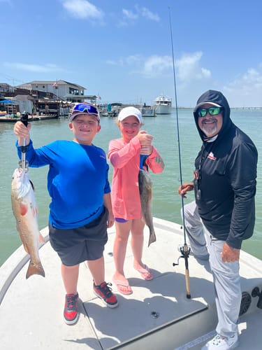 Customer photo review of Waterloo Blue Hooded Long Sleeve Performance Shirt - Trout Tails Up