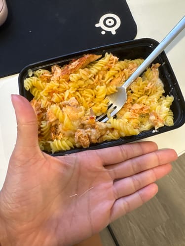 Customer photo review of Salmon Alfredo