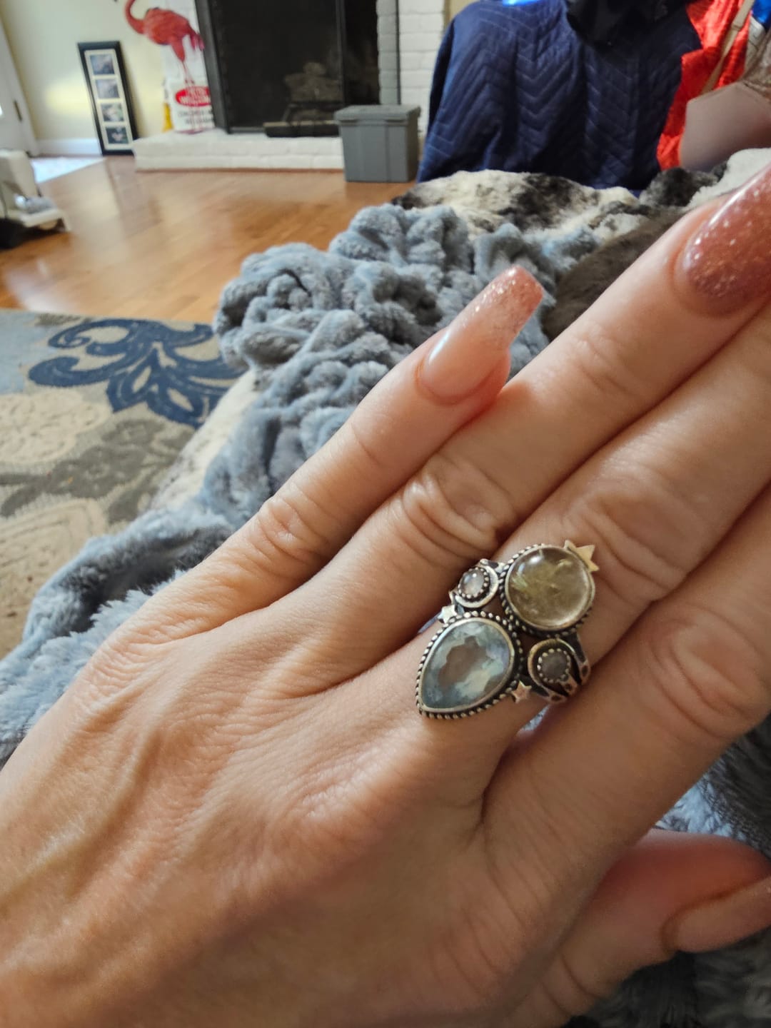 Customer photo review of Blue Topaz and Golden Rutilated Quartz Celestial Ring