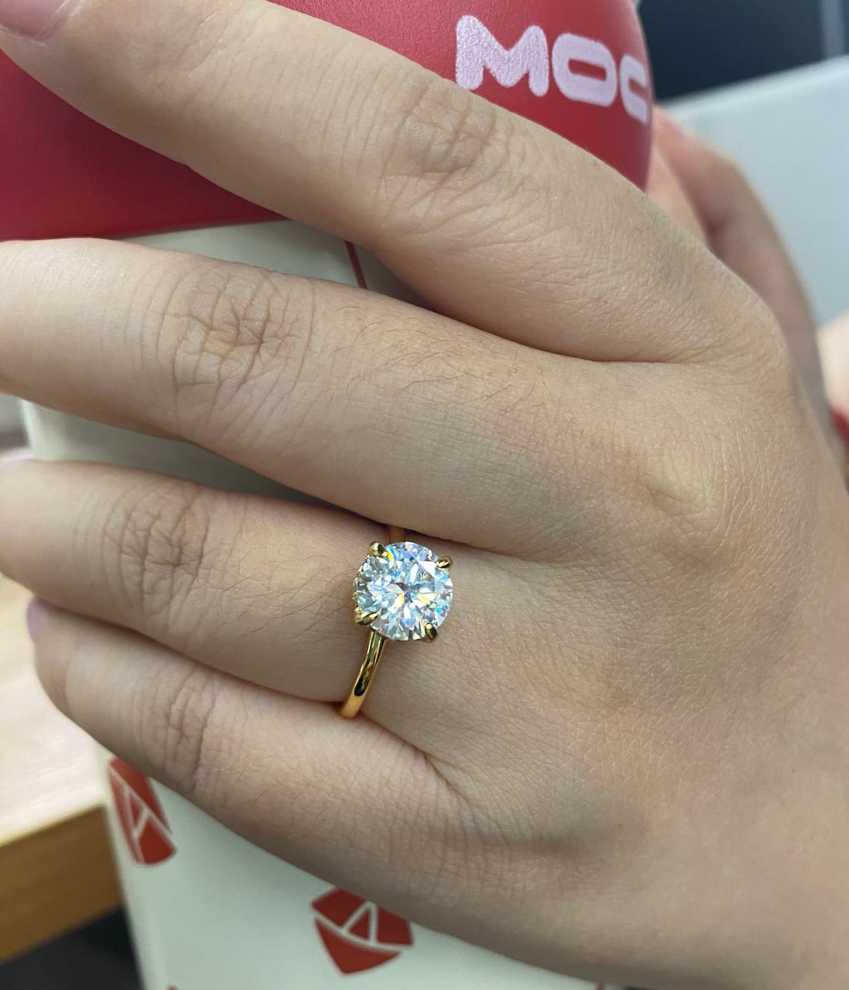 Customer photo review of Rodiffy Moissanite 2.0 Ct ~4.0 Ct Round Cut 6 Prong Yellow Gold Promise Ring