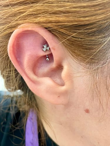 Customer photo review of Arete Triple Zirconia Perforación Tipo Rook Acero Quirurgico