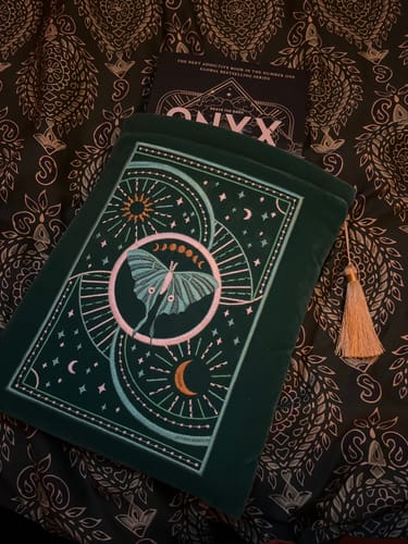 Customer photo review of Luna Moth Book Sleeve