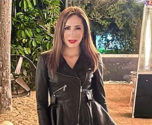 Customer photo review of Women's Black Peplum Leather Jacket – Asymmetrical