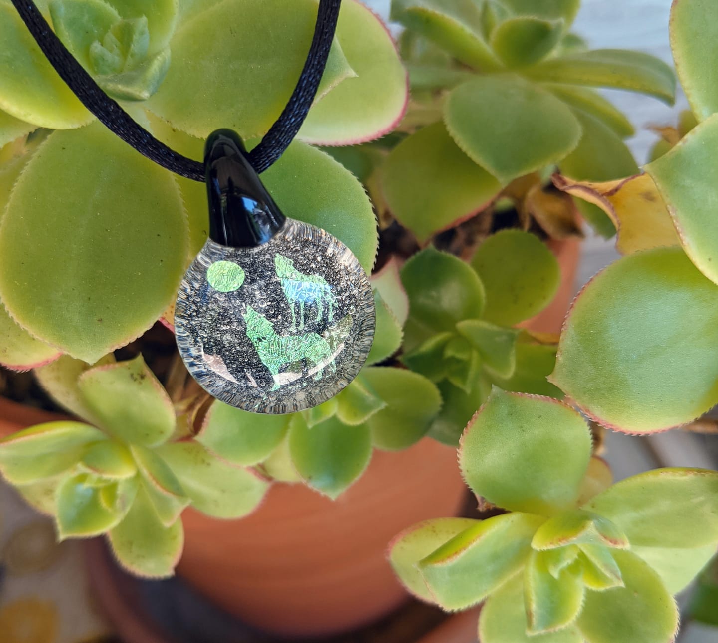 Customer photo review of Howling Wolf Hologram Pendant with Infused Cremation Ash