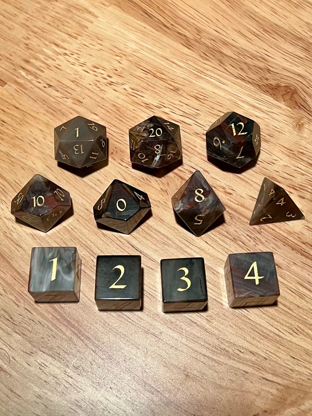 Customer photo review of URWizards D&D Petrified Wood Gemstone Engraved Dice Set(Limited edition)