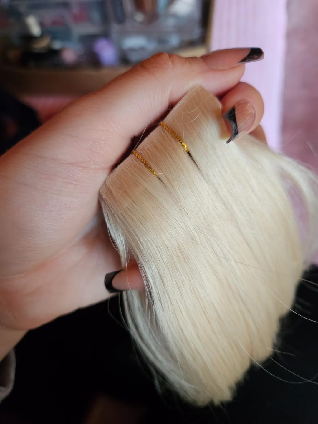 Customer photo review of Seamless Tape in Hair Extensions Best Virgin Hair Lightest Blonde #60