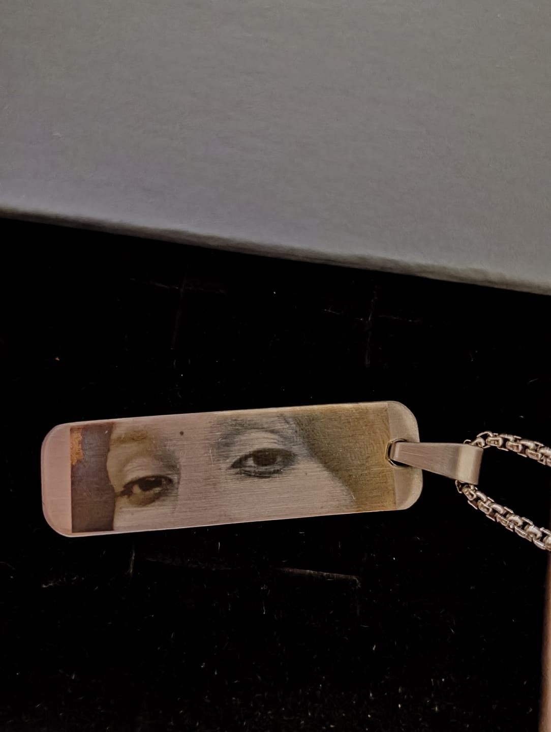 Customer photo review of Eyes Engraved Photo Pendant