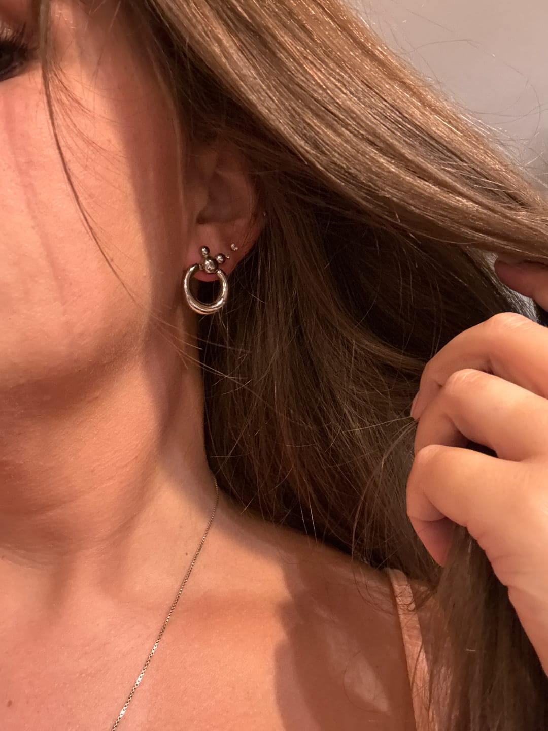 Customer photo review of Leader of the Club Earrings