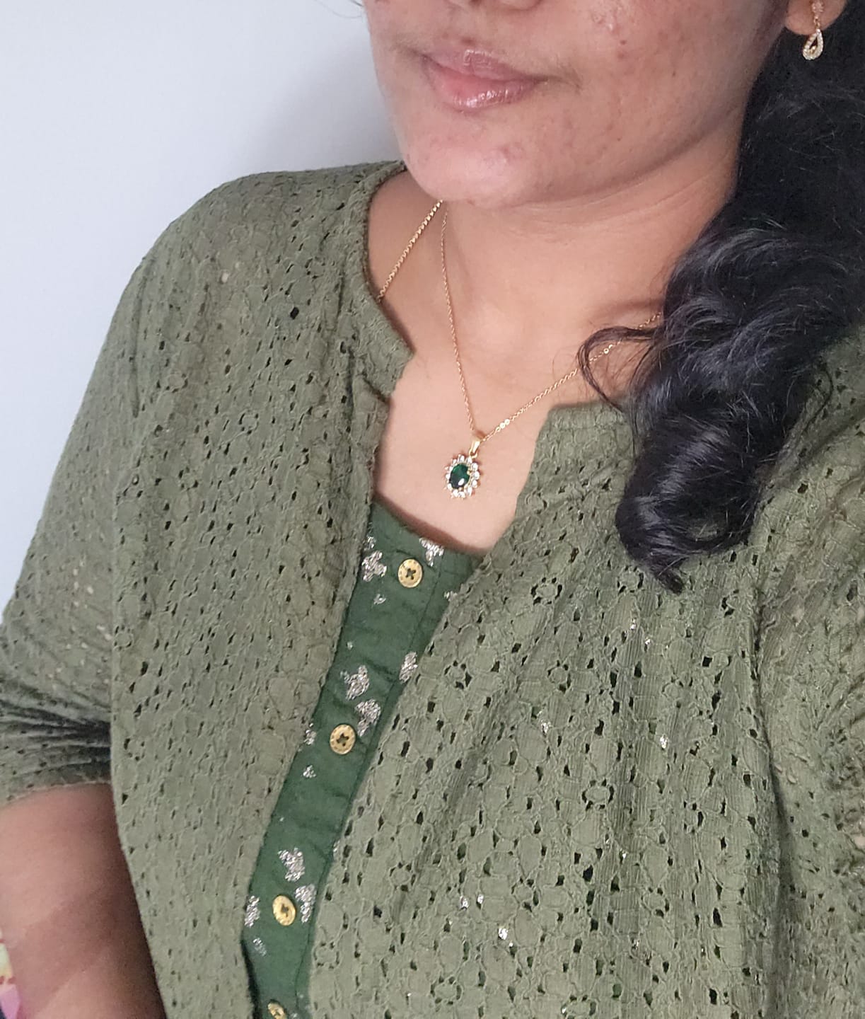 Customer photo review of Green Sapphire and Diamond Halo Pendant