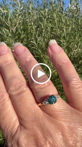 Customer video review of Green Moissanite Side Stone Engagement Ring