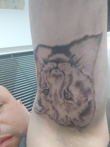 Customer photo review of Painless Tattoo Numbing Spray