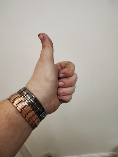 Customer photo review of Power of the Lord’s Prayer Magnetic Copper Bracelet : Helps Pair Veterans With A Service Dog Or Shelter Dog