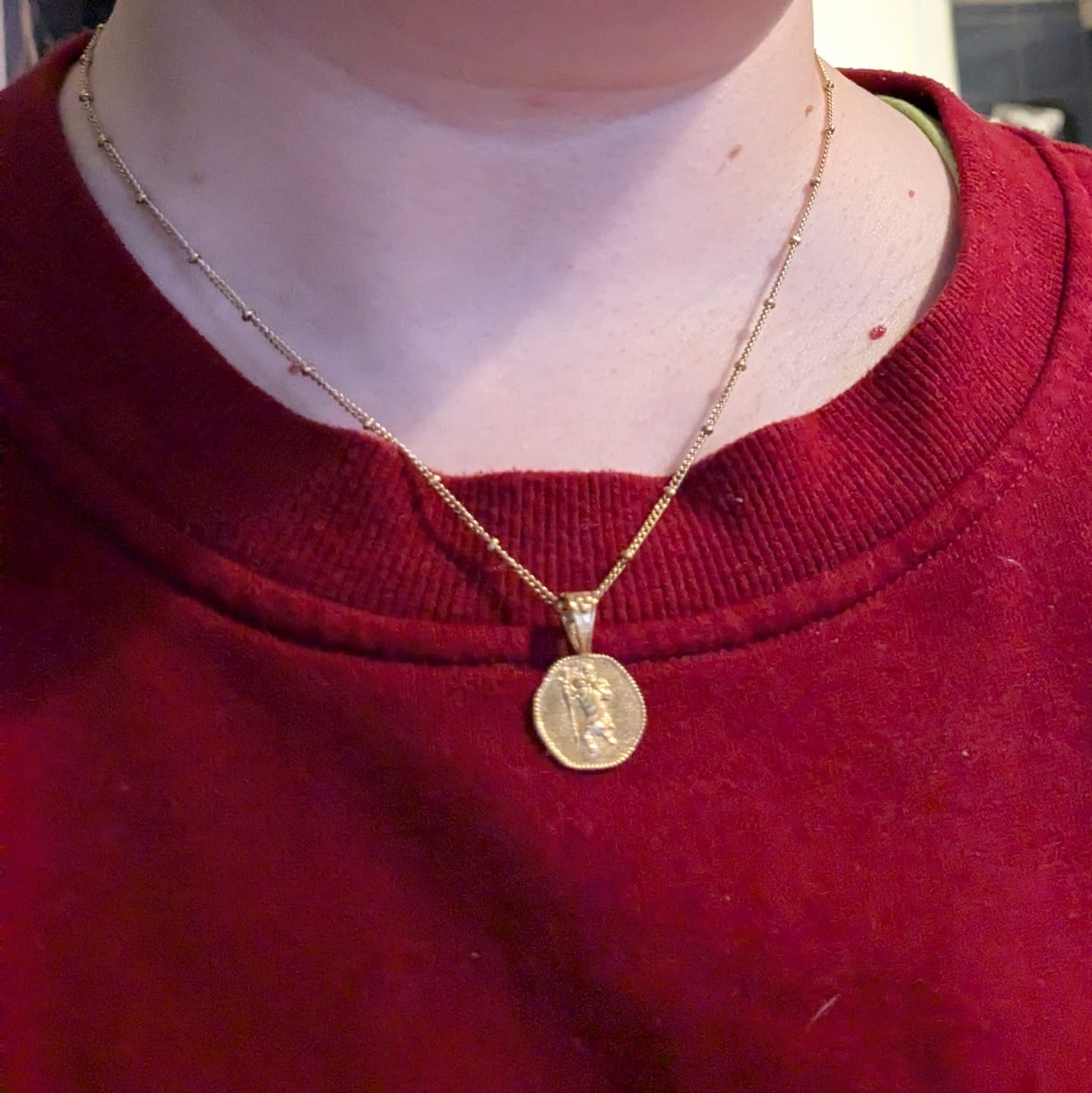 Customer photo review of St. Christopher Necklace - Stay Safe Wherever You Go