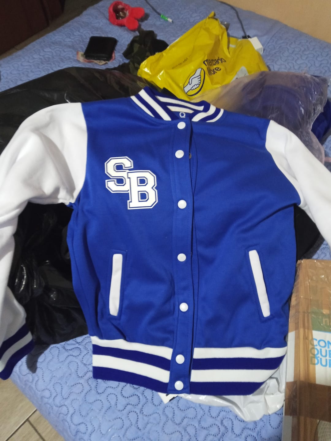 Customer photo review of Chamarra Universitaria Personalizada
