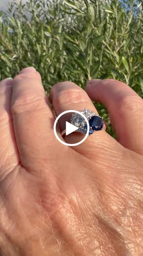 Alison B. review of Round Moissanite With Blue Sapphire Cluster Engagement Ring image 1 out of 1