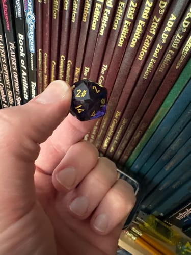 Customer photo review of Deep Plum Multifaceted Glass Dice Set