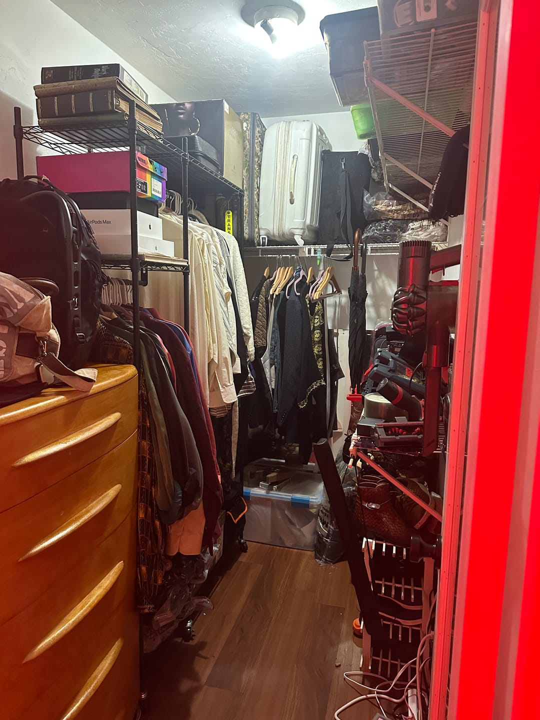 Customer photo review of Raybee Heavy Duty Portable Clothes Rack With Wheels,Clothing Rack For Hanging,Garment Rack For Bedroom