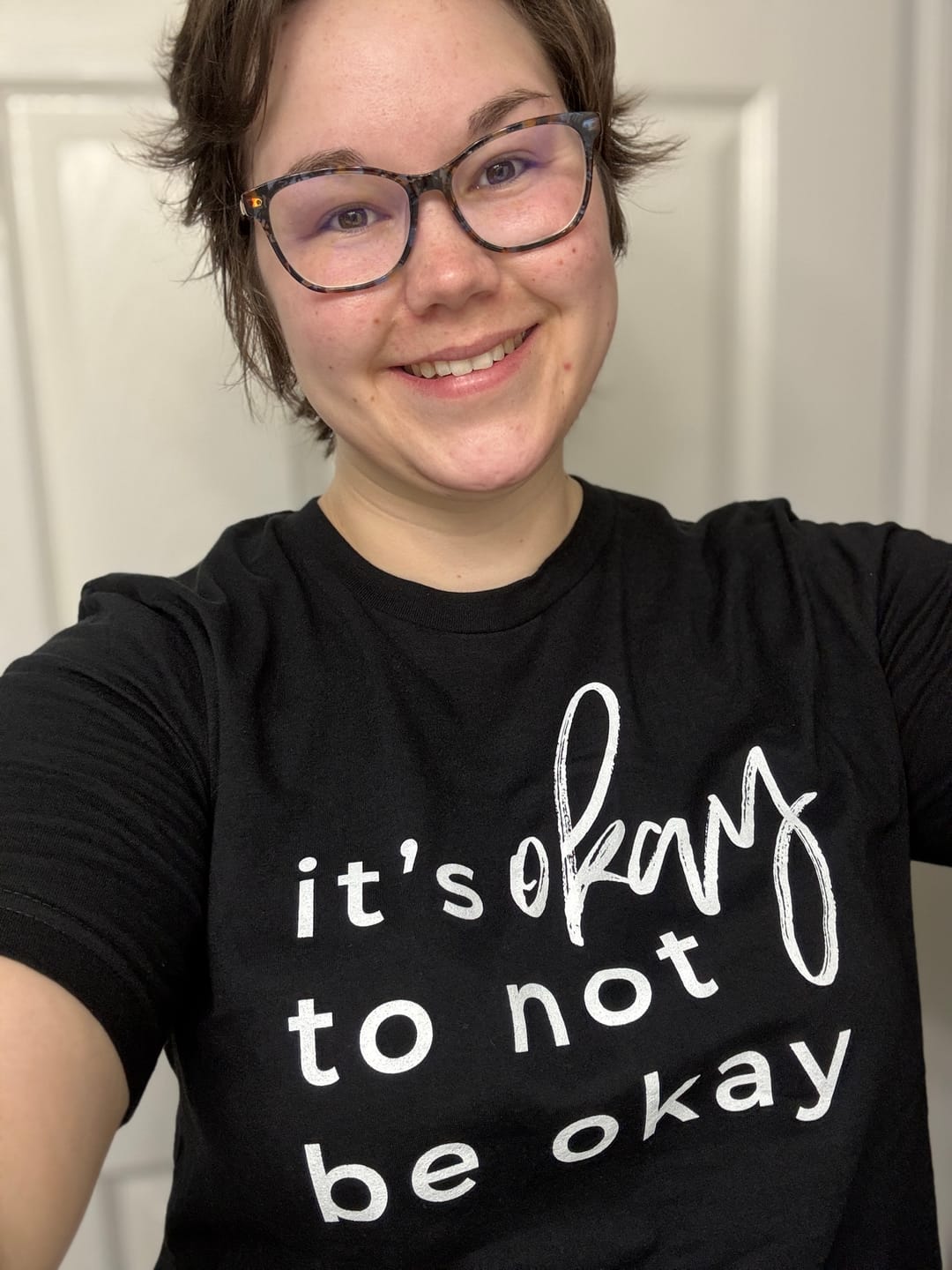 Customer photo review of It's Okay To Not Be Okay T-Shirt