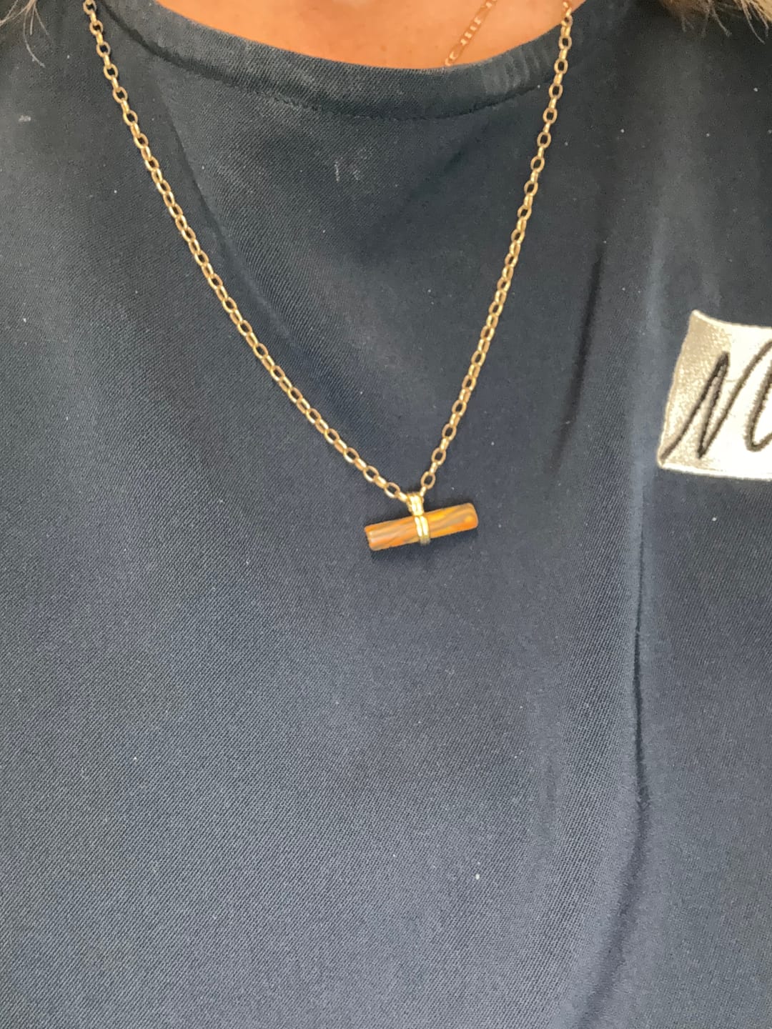 Customer photo review of Olivenorma Natural Tiger Eye Balancing Wood Pendant Necklace
