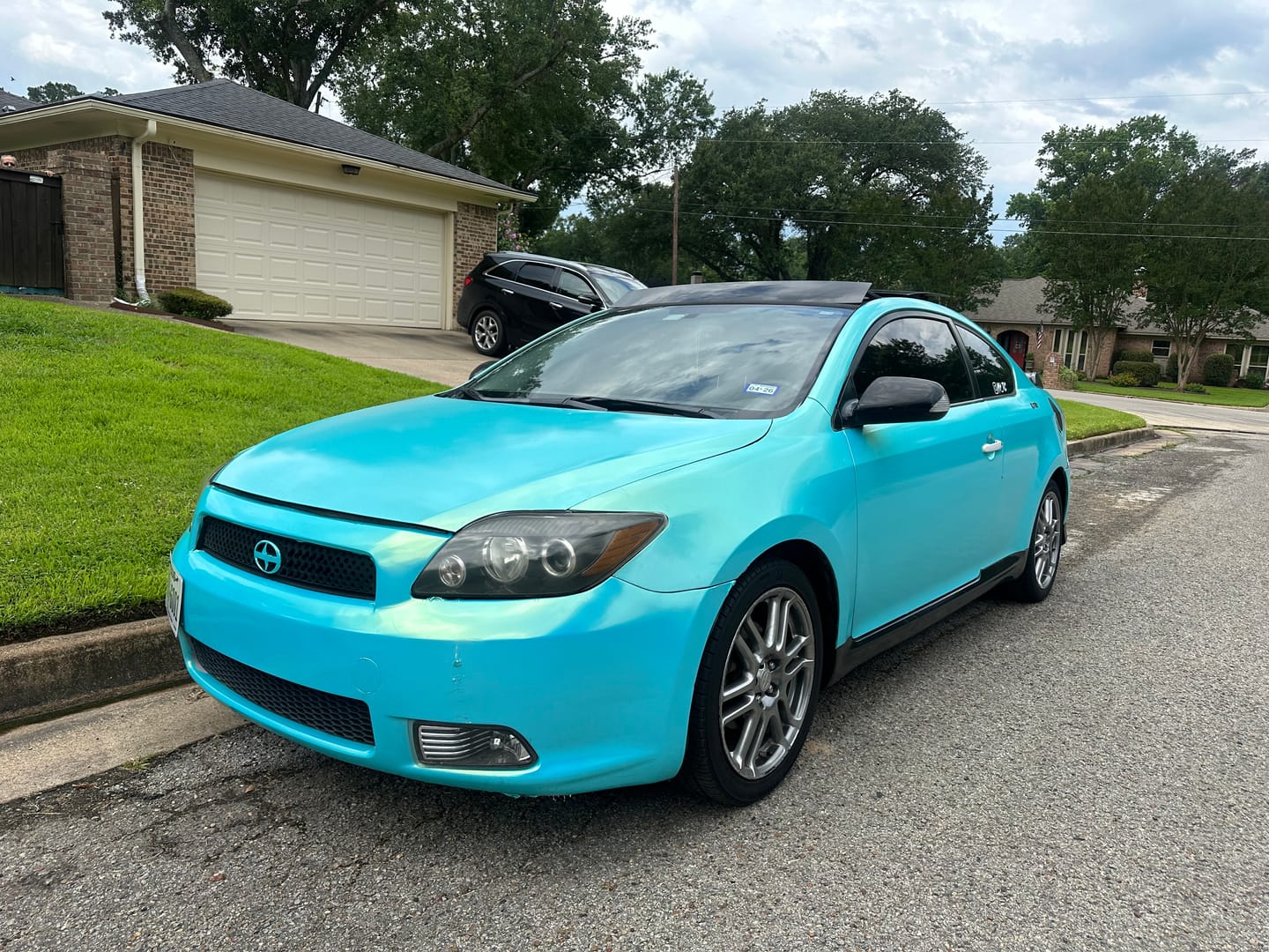 Customer photo review of Candy Metallic Neon Ice Blue Vinyl Wrap