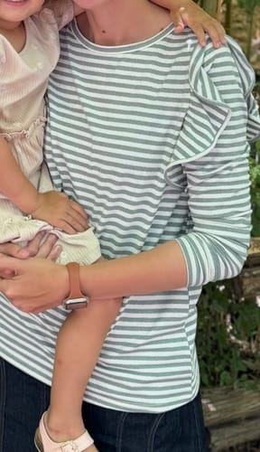 Customer photo review of Striped Ruffle Accent Long Sleeve Tee