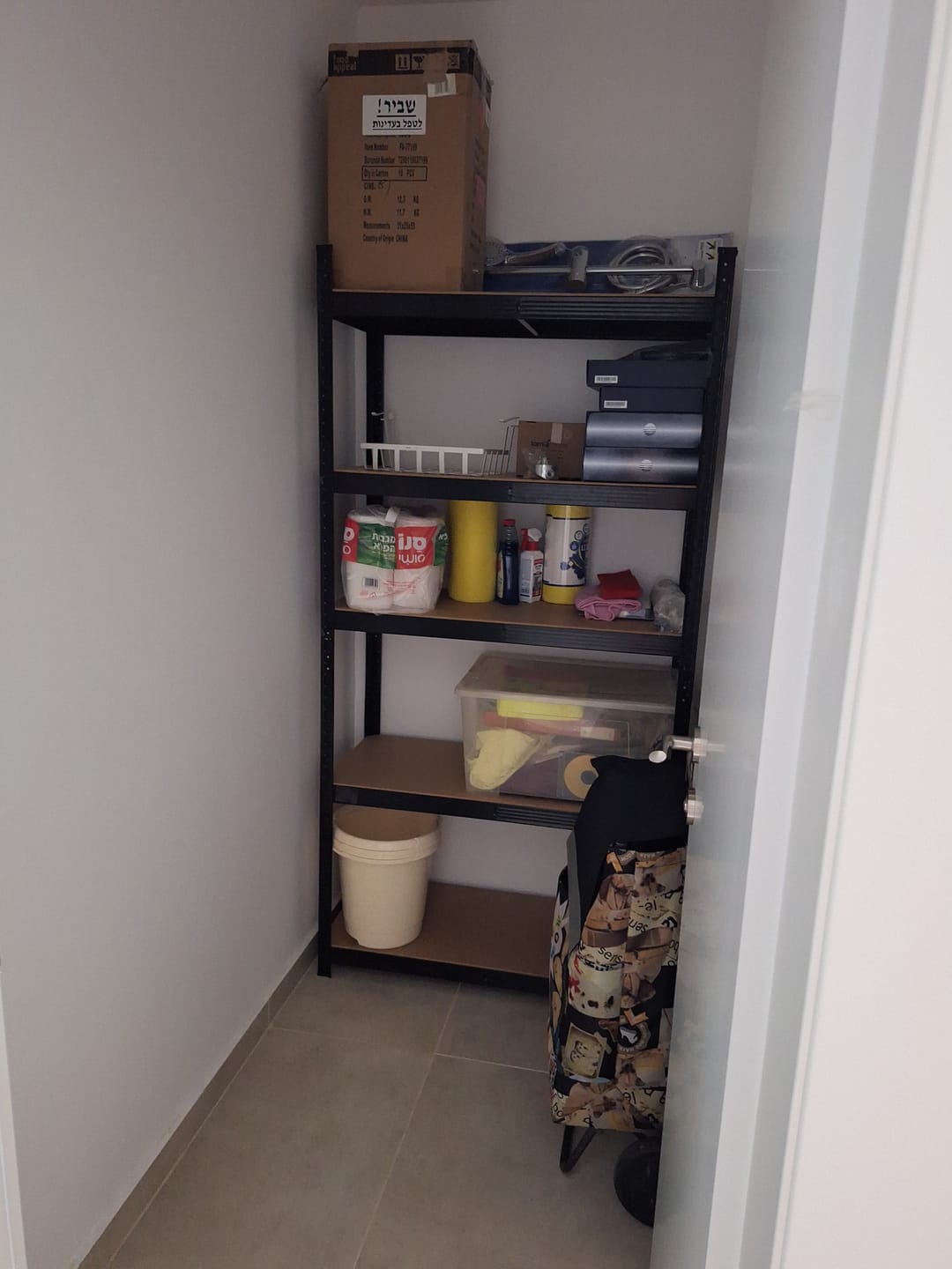 Customer photo review of כוננית מתכת מחוזקת 5 מדפים מודולריים גובה 180