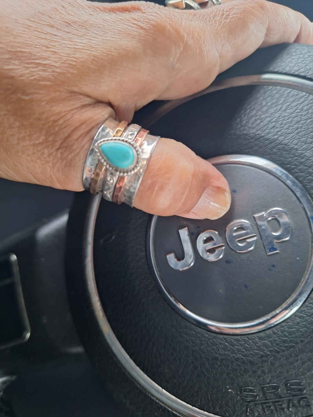 Customer photo review of Teardrop Turquoise Fidget Ring Sterling Silver