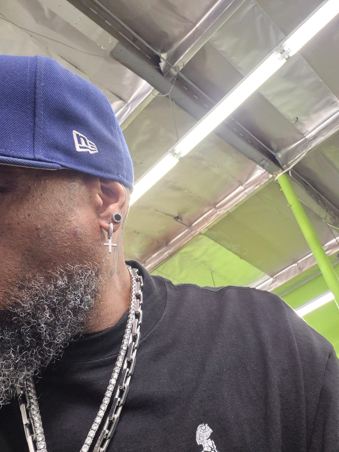 Customer photo review of Iced Cross Earrings - White Gold