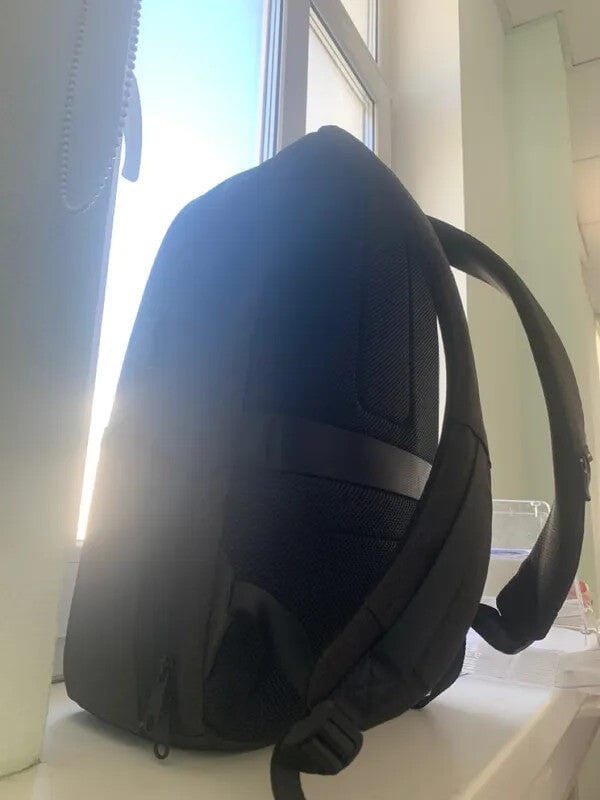 Customer photo review of Protector II: Upgrade Diamond-cut Design Hard shell Waterproof Multifunctional  Laptop Backpack