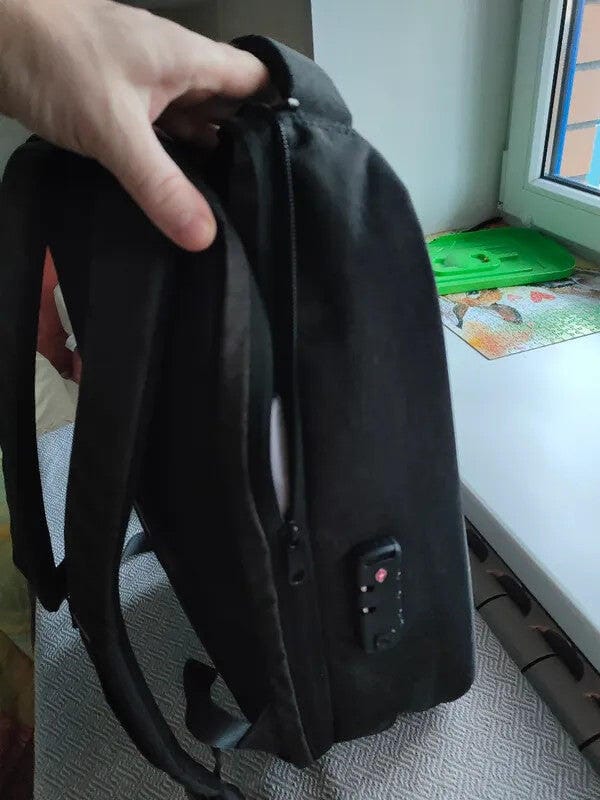 Customer photo review of Protector II: Upgrade Diamond-cut Design Hard shell Waterproof Multifunctional  Laptop Backpack