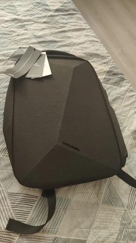 Customer photo review of Protector II: Upgrade Diamond-cut Design Hard shell Waterproof Multifunctional  Laptop Backpack