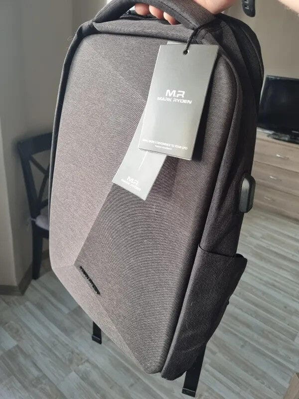 Customer photo review of Protector II: Upgrade Diamond-cut Design Hard shell Waterproof Multifunctional  Laptop Backpack