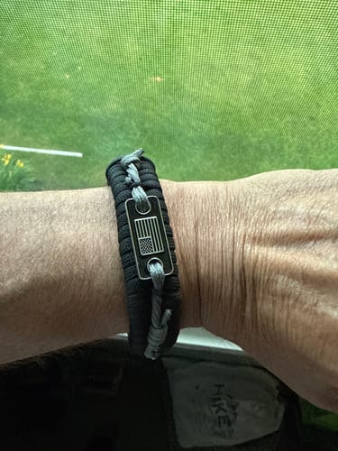 Customer photo review of Never Surrender Barbed Wire Paracord Bracelet: Helps Pair Veterans With A Service Dog Or Shelter Dog