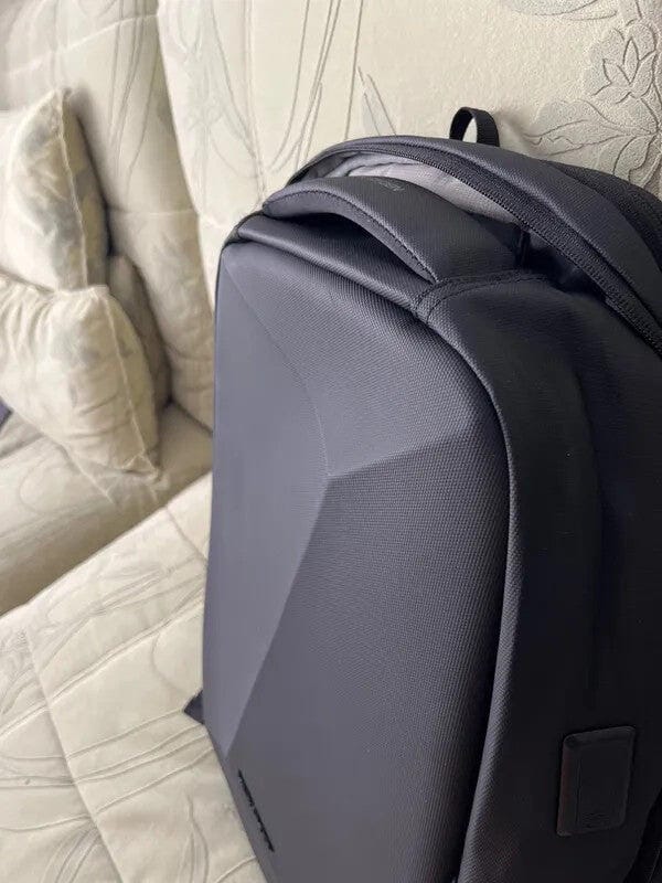 Customer photo review of Protector II: Upgrade Diamond-cut Design Hard shell Waterproof Multifunctional  Laptop Backpack