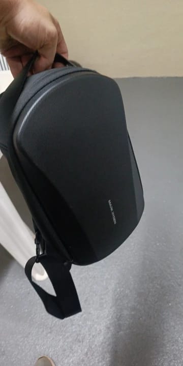 Customer photo review of The Ratio Arc Mini: MarkRyden First Kickstarter campaign - Hard-shell Waterproof Crossbody Bag
