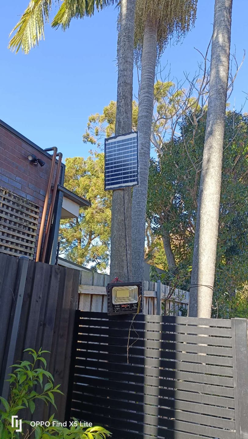 Customer photo review of 100W LED Solar Flood Lights  JD-88100 Outdoor Back Yard Garden Path Last All night