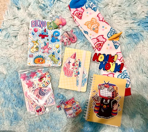 Customer photo review of Primary Clown TV Head Small Reusable Sticker Book