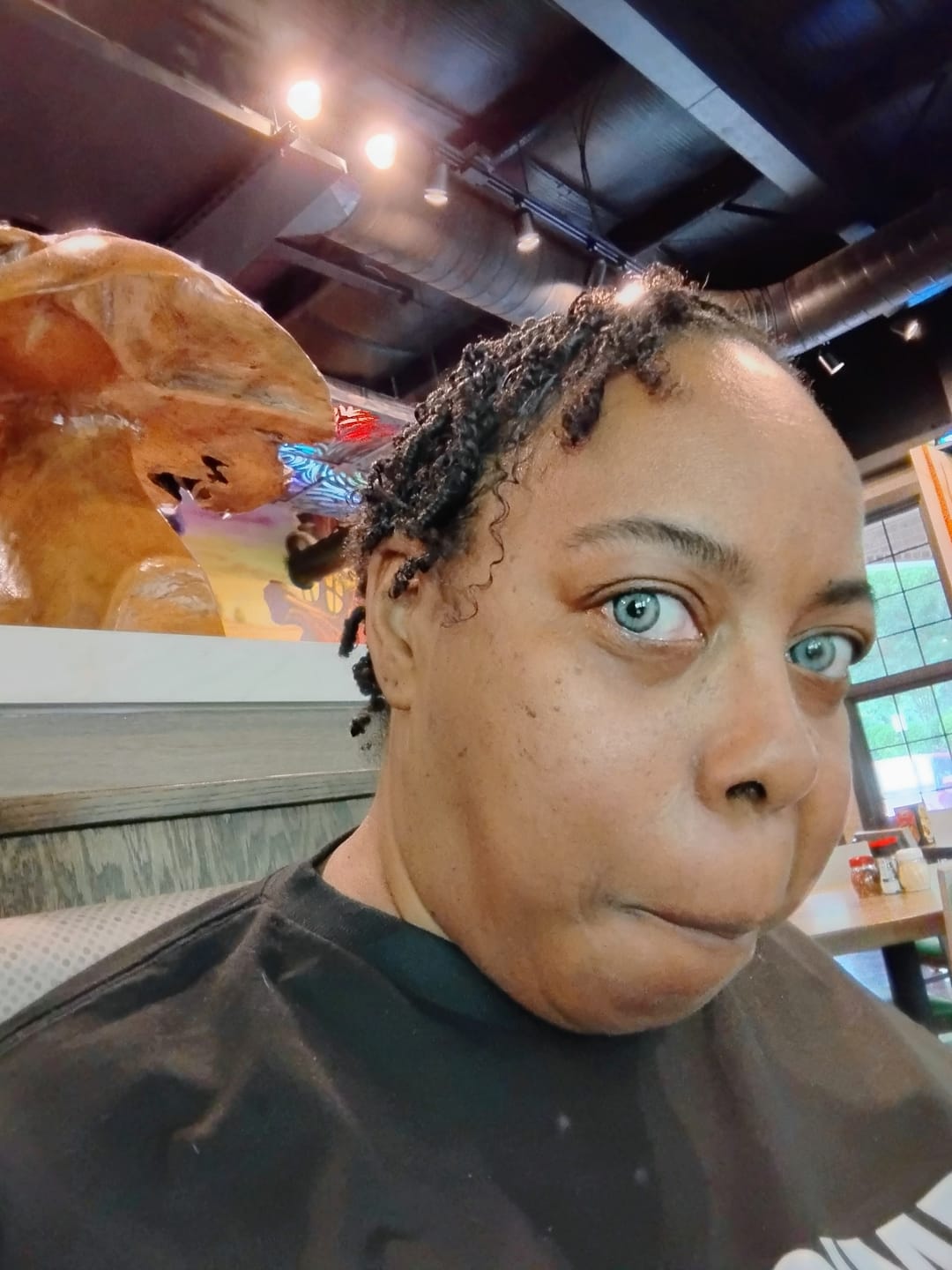 Customer photo review of Aine Swan Lake Blue Prescription Colored Contact Lenses