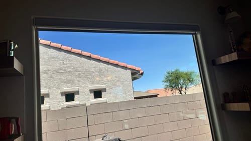 Customer photo review of SmartWings Motorized Light Filtering Roller Shades 70% Blackout Safari