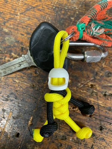 Customer photo review of Yellow Biker Buddy Paracord Keychain