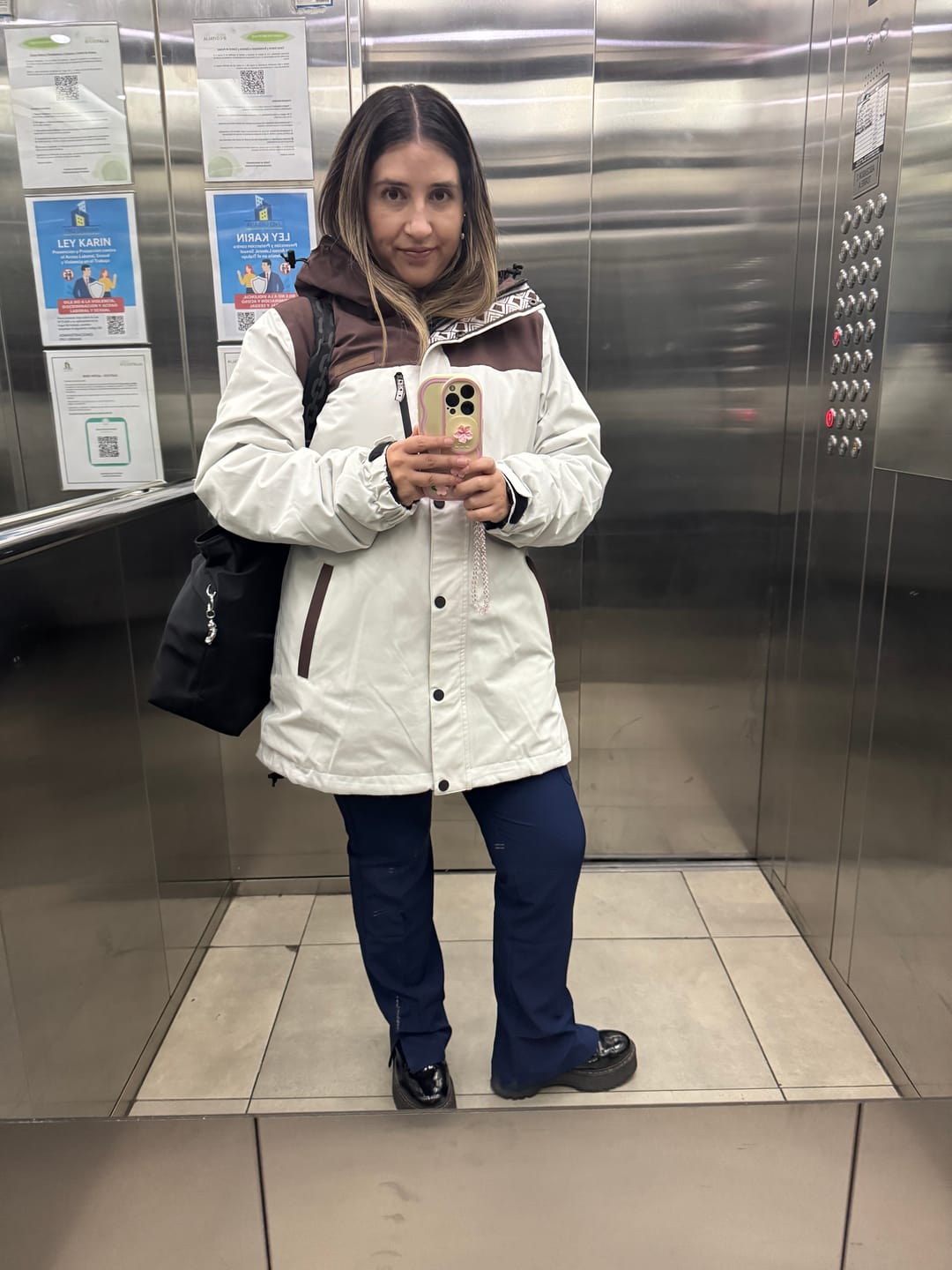 Customer photo review of Parka Impermeable Reversible Camaleon Mujer