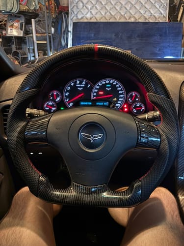 Customer photo review of Genuine Carbon Fiber Steering Wheel With Button Trim For C6 Corvette 2006-2011