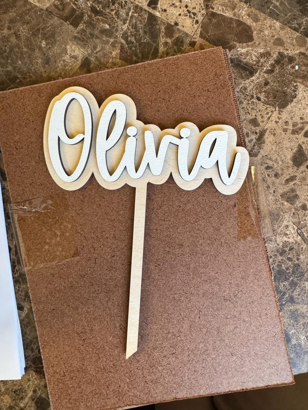Customer photo review of Name Cake Topper